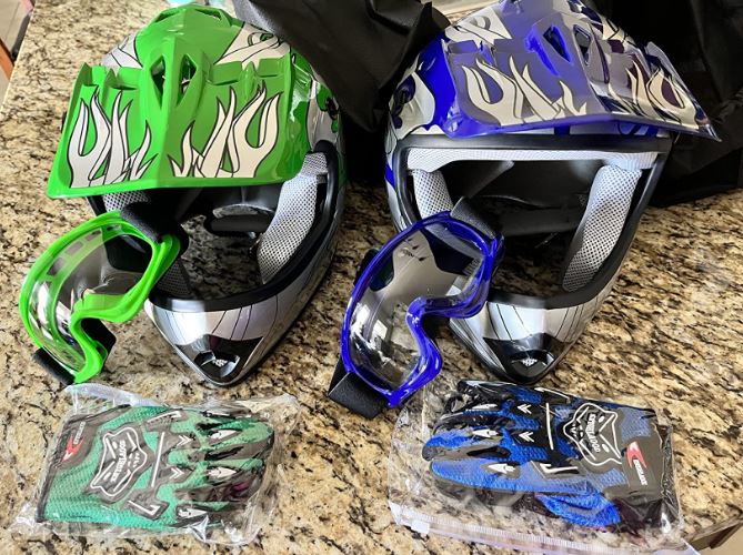 complete set of goggles, helmets, and gloves